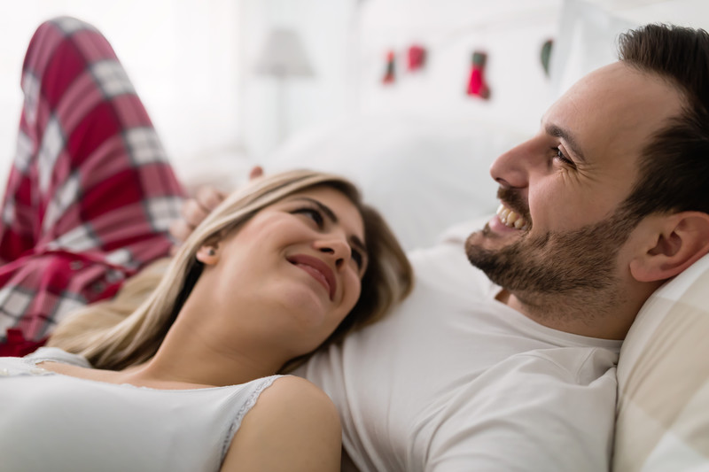 Happy couple romantic sex bedroom
